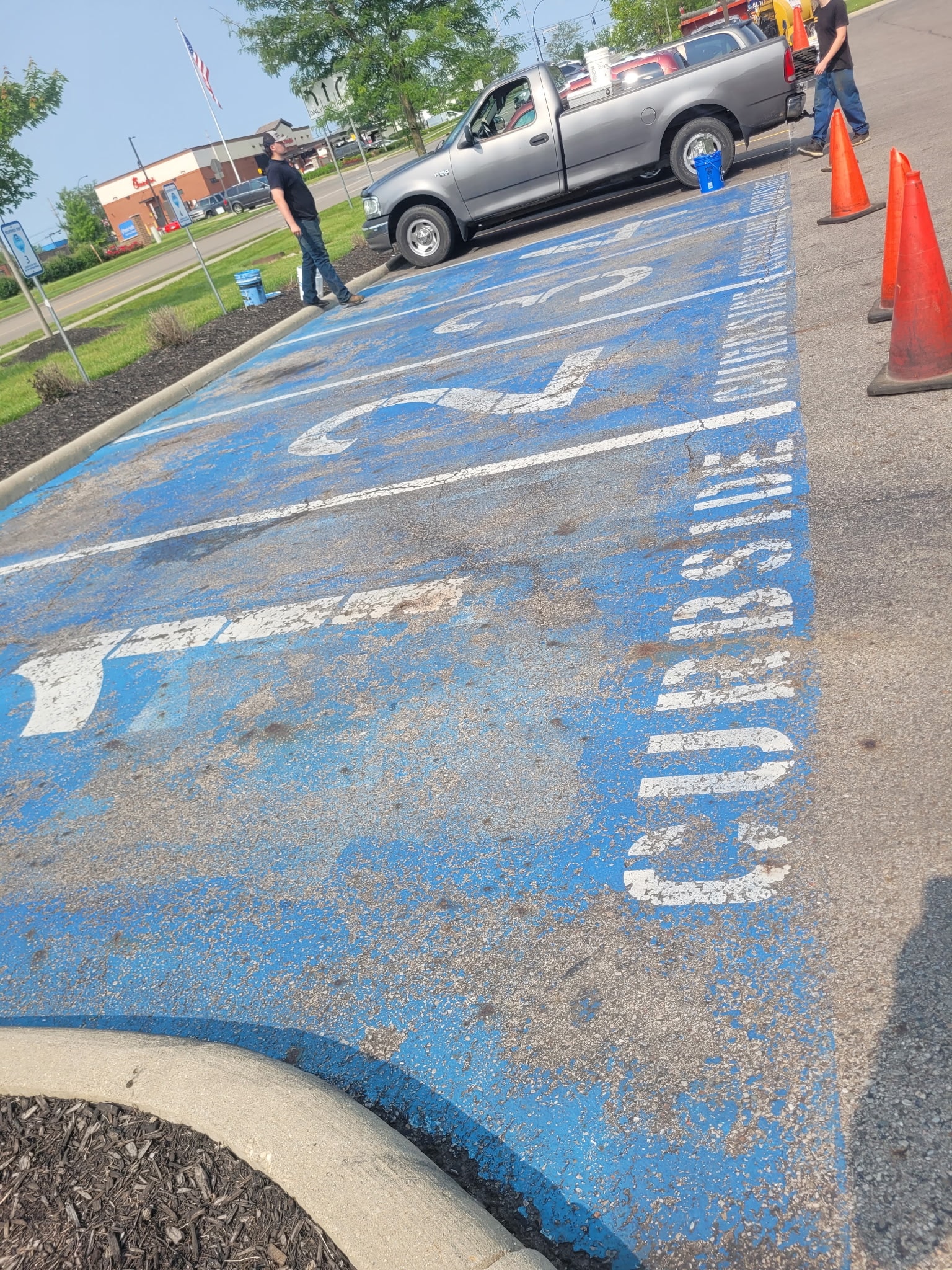 Commercial Handicap Striping — before